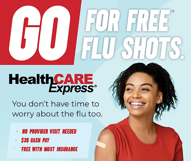 An Image that reads "Get Your Free Flu Shot" with A man holding a shield with a red cross on the side.